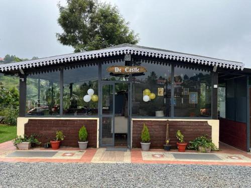a restaurant with a sign that reads bar cafe at Moonlight Chillers By LexStays in Yedapalli