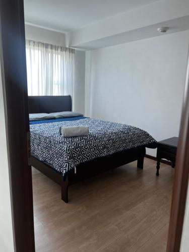 sypialnia z łóżkiem w pokoju w obiekcie Comodidad y privacidad en un solo lugar w mieście Heredia