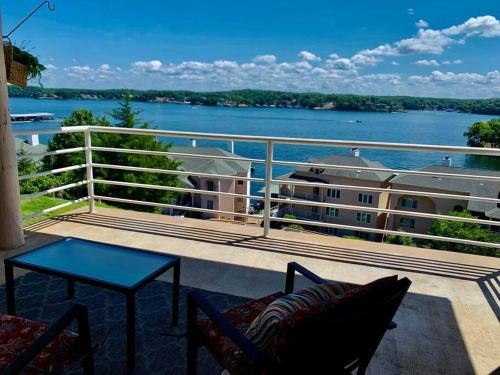a balcony with a view of the water at The best lake view in Ozark. in Lake Ozark