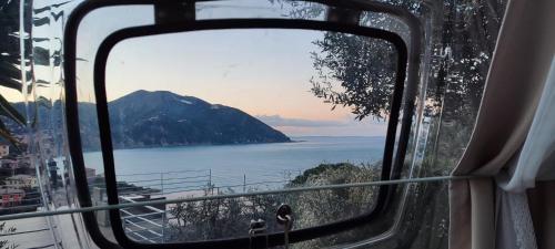 a view of the ocean from a bus window at Counting Stars in Recco