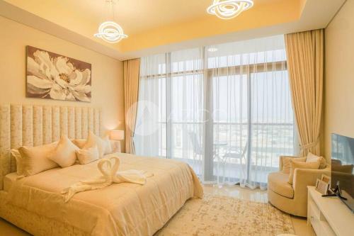 Postel nebo postele na pokoji v ubytování Elegant Studio at Aykon City Tower - C