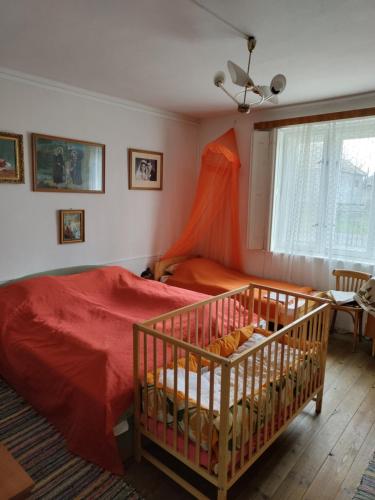 Postel nebo postele na pokoji v ubytování Vinyl House