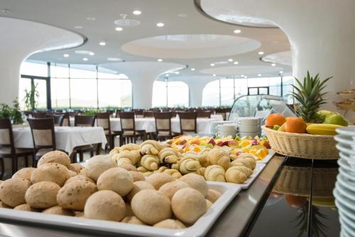 a buffet of food on a table in a restaurant at Grand Hotel Neum Wellness & Spa in Neum
