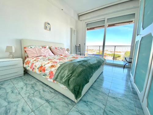 Ένα ή περισσότερα κρεβάτια σε δωμάτιο στο Il Mare in una Stanza Riccione