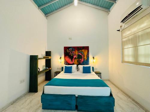 a bedroom with a large bed in a room at Moi Galle Fort by DBI in Galle