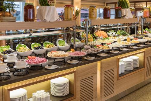 a buffet with a lot of food on display at Hermanos Hotel in Istanbul