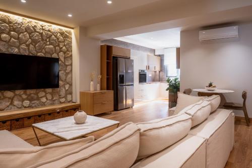 TV a/nebo společenská místnost v ubytování Num Suites & Lofts Athens