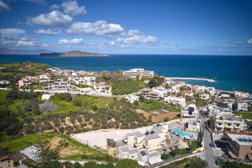 an aerial view of a city and the ocean at Villaggio Mare Suites in Kalamaki Chanion