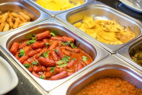 a tray of food with meat and french fries at Hermanos Hotel in Istanbul