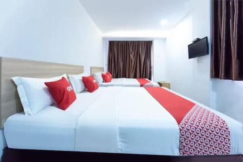 Postel nebo postele na pokoji v ubytování NORTH CITY HOTEL