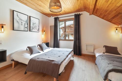 Postel nebo postele na pokoji v ubytování Chalet les 3 Pîtres - 10 personnes - Pelvoux Les Ecrins