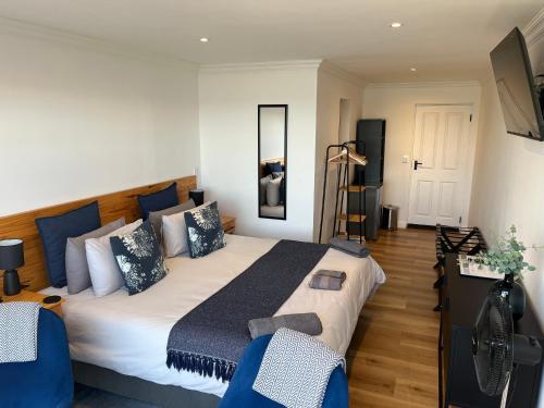 Ein Bett oder Betten in einem Zimmer der Unterkunft De View
