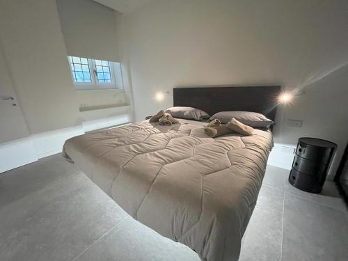 Postel nebo postele na pokoji v ubytování Gallienus Superior Apartment