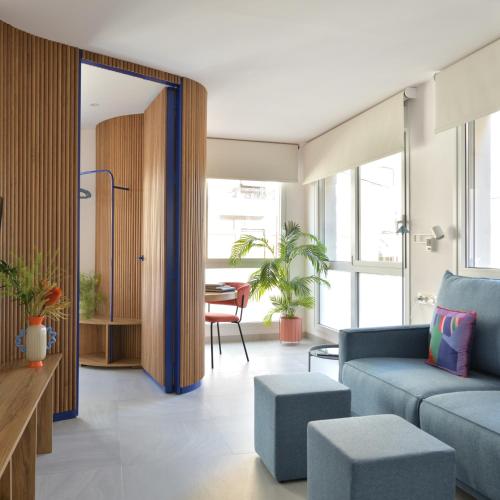 Χώρος καθιστικού στο PATIO de SOMBRA · Urban Suites