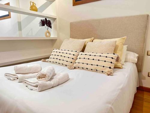 Luxury Suite - Corte Ingles Vigo tesisinde bir odada yatak veya yataklar
