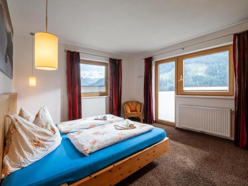 Ліжко або ліжка в номері Ahornegg