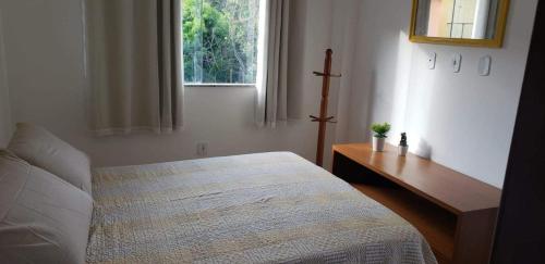Postel nebo postele na pokoji v ubytování Village Jardins