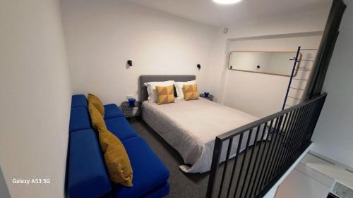 Ένα ή περισσότερα κρεβάτια σε δωμάτιο στο KaunasInn Loft