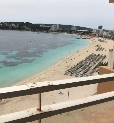 a view of a beach and the ocean at APARTMENT MAGALUF in Torrenova