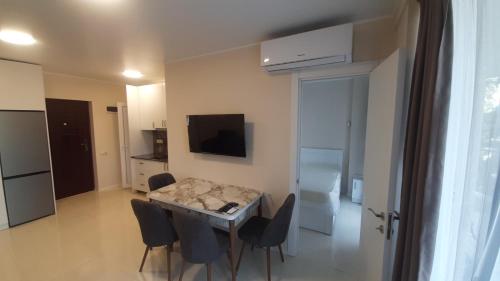 TV a/nebo společenská místnost v ubytování Apartment in Kobuleti