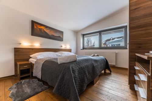 Ένα ή περισσότερα κρεβάτια σε δωμάτιο στο Mountain Villas Polana
