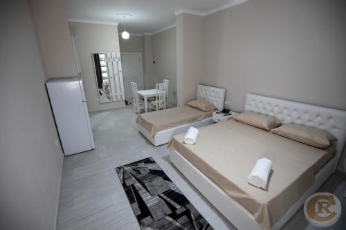 Postel nebo postele na pokoji v ubytování Colombo Residence Rooms