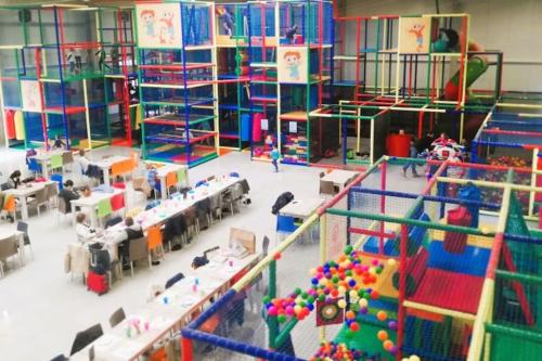 an overhead view of a play room with toys at La maison de Timao in Hannut