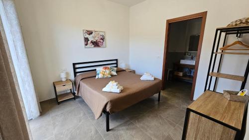 Postel nebo postele na pokoji v ubytování Il sogno di Gaggiuin