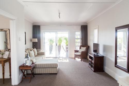 Posedenie v ubytovaní Nahoon Beach Villas Self Catering Apartments