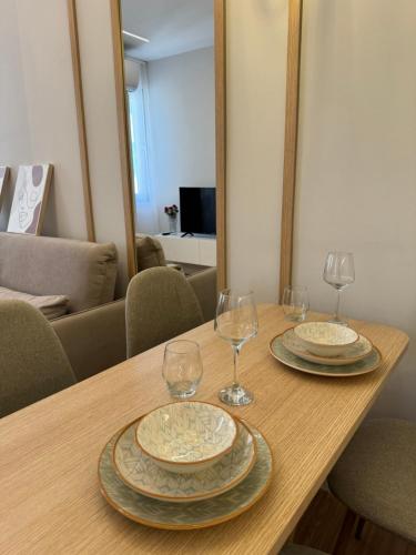 Un televizor și/sau centru de divertisment la Nomad Stay Apartments