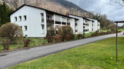a large white building on the side of a road at Ferienwohnung Lea in Bad Reichenhall