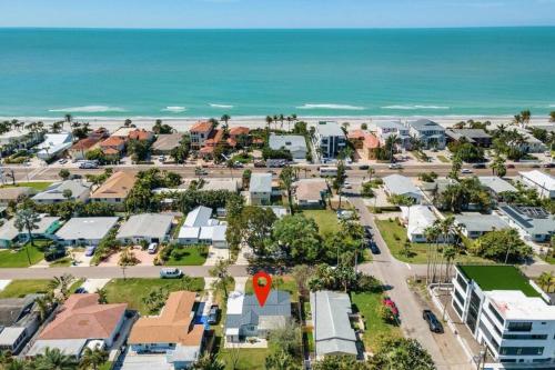 an aerial view of a town with a red balloon at Stylish Bungalow Steps to Beach! in St Pete Beach