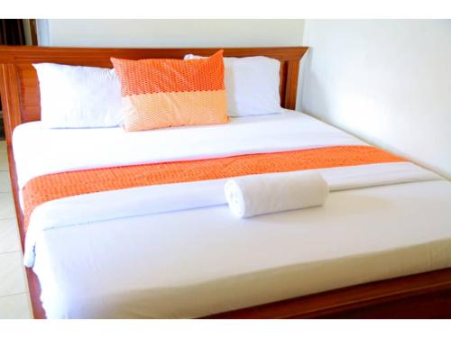 Ένα ή περισσότερα κρεβάτια σε δωμάτιο στο Macchiato Suites Boutique Hotel