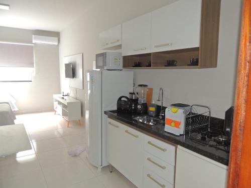 A kitchen or kitchenette at Porto Residence