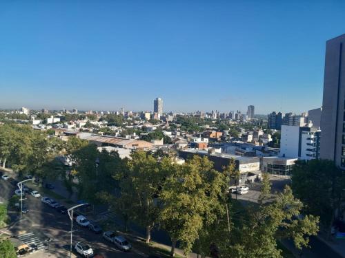 an aerial view of a city with buildings at Dazzler by Wyndham Rosario in Rosario
