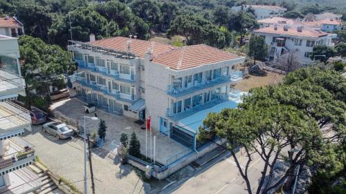 an overhead view of a large blue house at Mavi Cam Hotel Ayvalik in Sefaçamlık