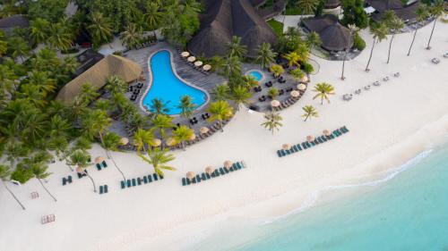 an aerial view of a resort on a beach at Kuredu Island Resort & Spa in Kuredu