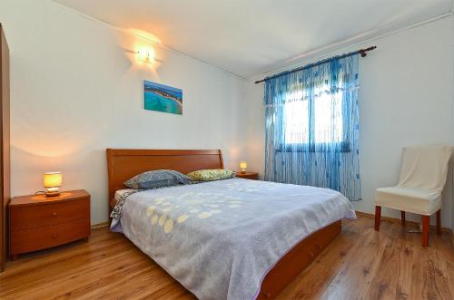 Ένα ή περισσότερα κρεβάτια σε δωμάτιο στο Apartments Olea Phasiana