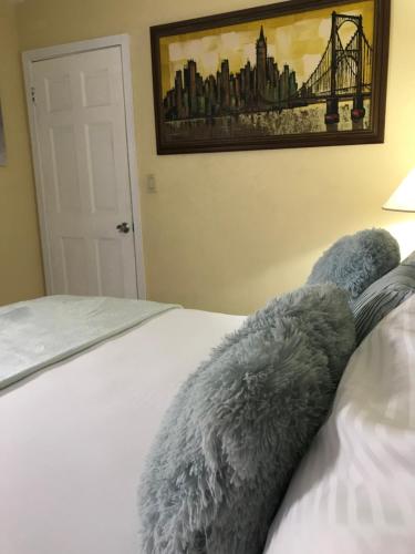 two stuffed animals laying on top of a bed at Perfect get away from big city life in Freeport