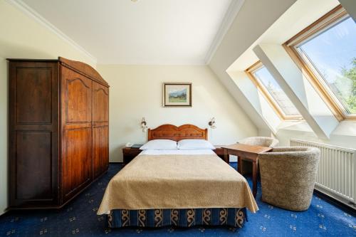 Postel nebo postele na pokoji v ubytování Hotel Belvedere Resort&SPA