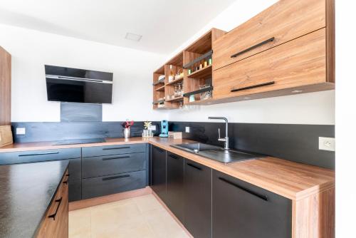 Dapur atau dapur kecil di Villa Sérénity 10 pers maxi