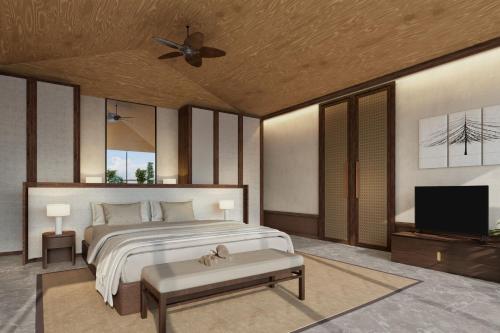 Tempat tidur dalam kamar di Lampung Marriott Resort & Spa