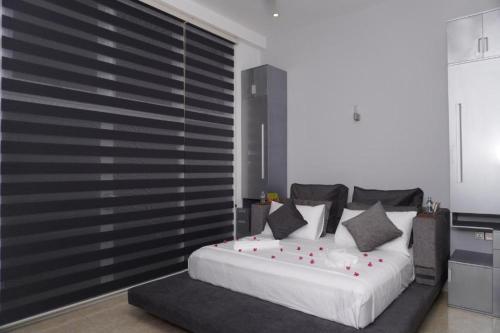 Postel nebo postele na pokoji v ubytování Fortview International Hotel