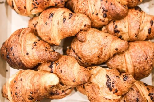 a pile of croissants piled on top of each other at Albergo Firenze in Florence