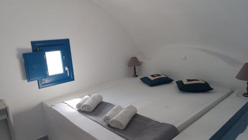 Ένα ή περισσότερα κρεβάτια σε δωμάτιο στο BlackBeach village