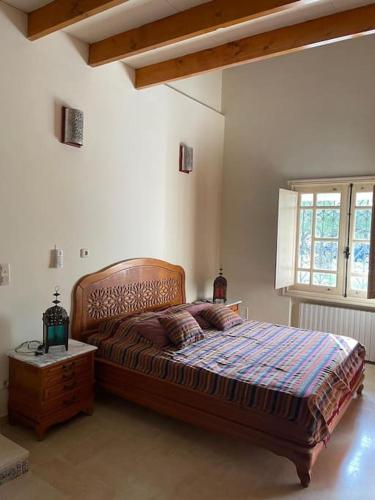 Postel nebo postele na pokoji v ubytování Dar al Murad : Une maison, un coin de paradis