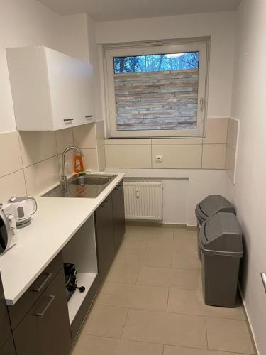 Virtuvė arba virtuvėlė apgyvendinimo įstaigoje MK Apartments Delmenhorst 1