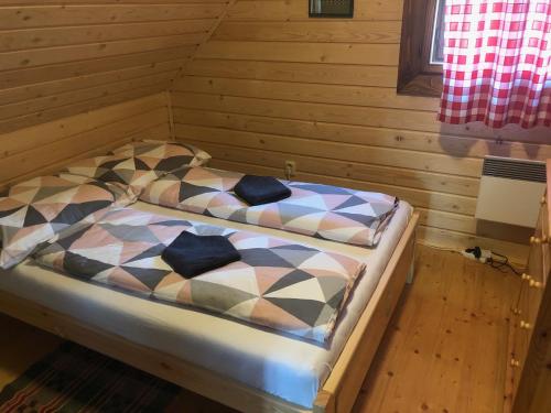 Postel nebo postele na pokoji v ubytování Chalúpka pri Mare