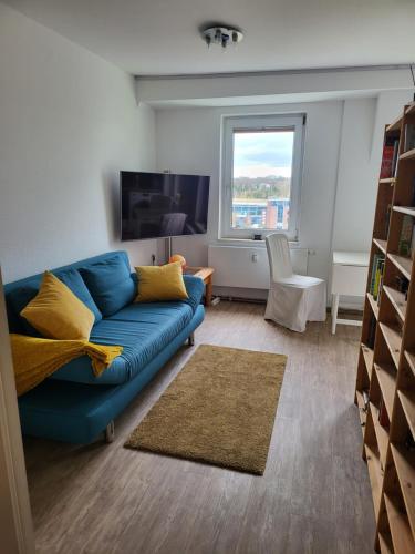 Posezení v ubytování Ferienwohnung im Dachgeschoss mit Aufzug
