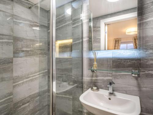 a bathroom with a sink and a shower at 1 Bed in Lytham 86044 in Saint Annes on the Sea